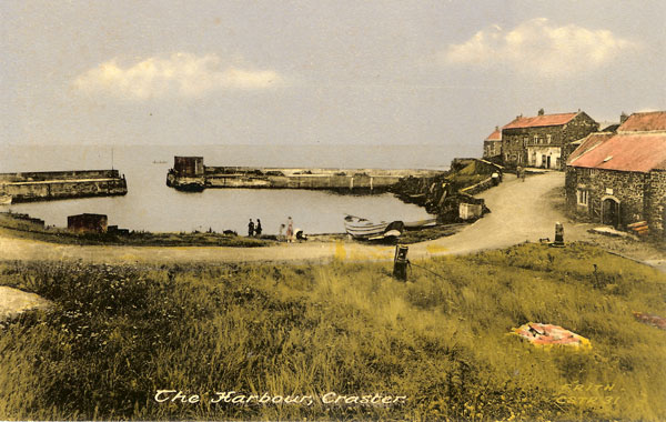 Photograph showing both capstans, now out of use and surrounded by grass