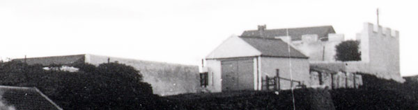 Wall surrounding the garden of  the coastguard cottages