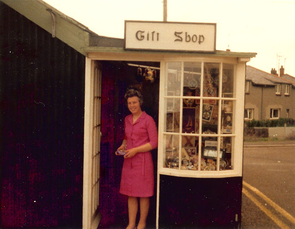 Sybil Dawson standing outside the gift shop in 1975