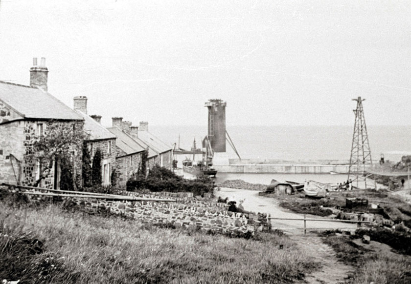 A steamer ready to load stone from the bins.