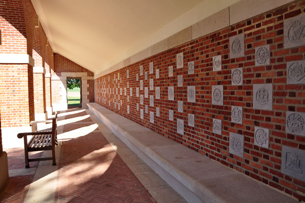 The covered walkway displaying battalion insignia at Heilly Gate Station
